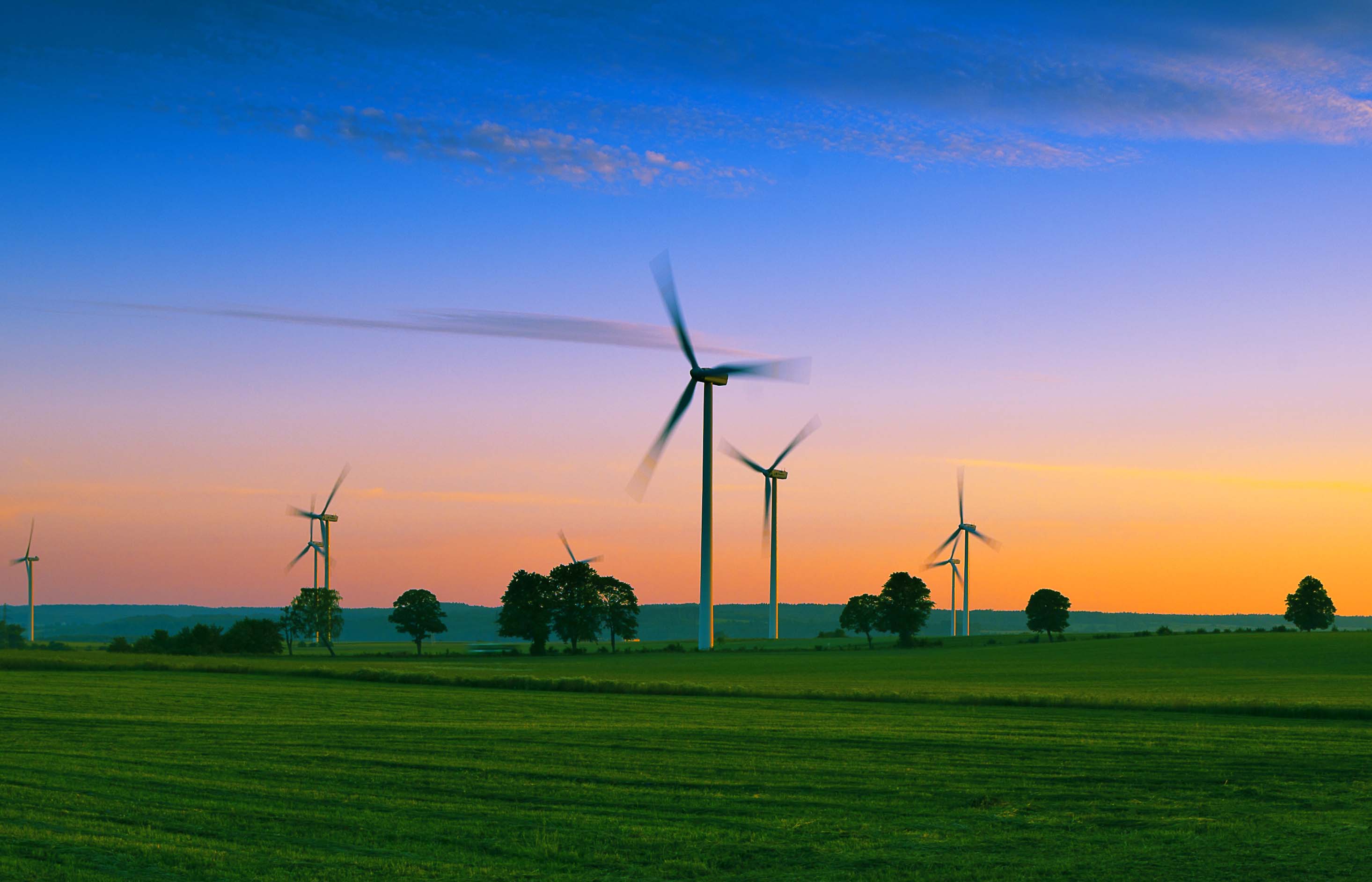 Windmills in sunset AdobeStock_67954208-1-1-1